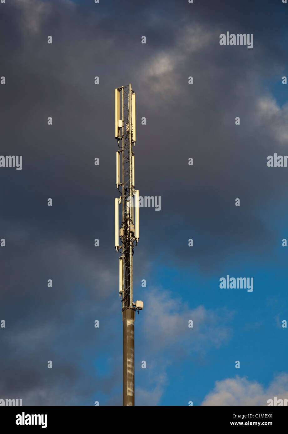 Cellular network antennas on top of a antenna mast , Finland Stock