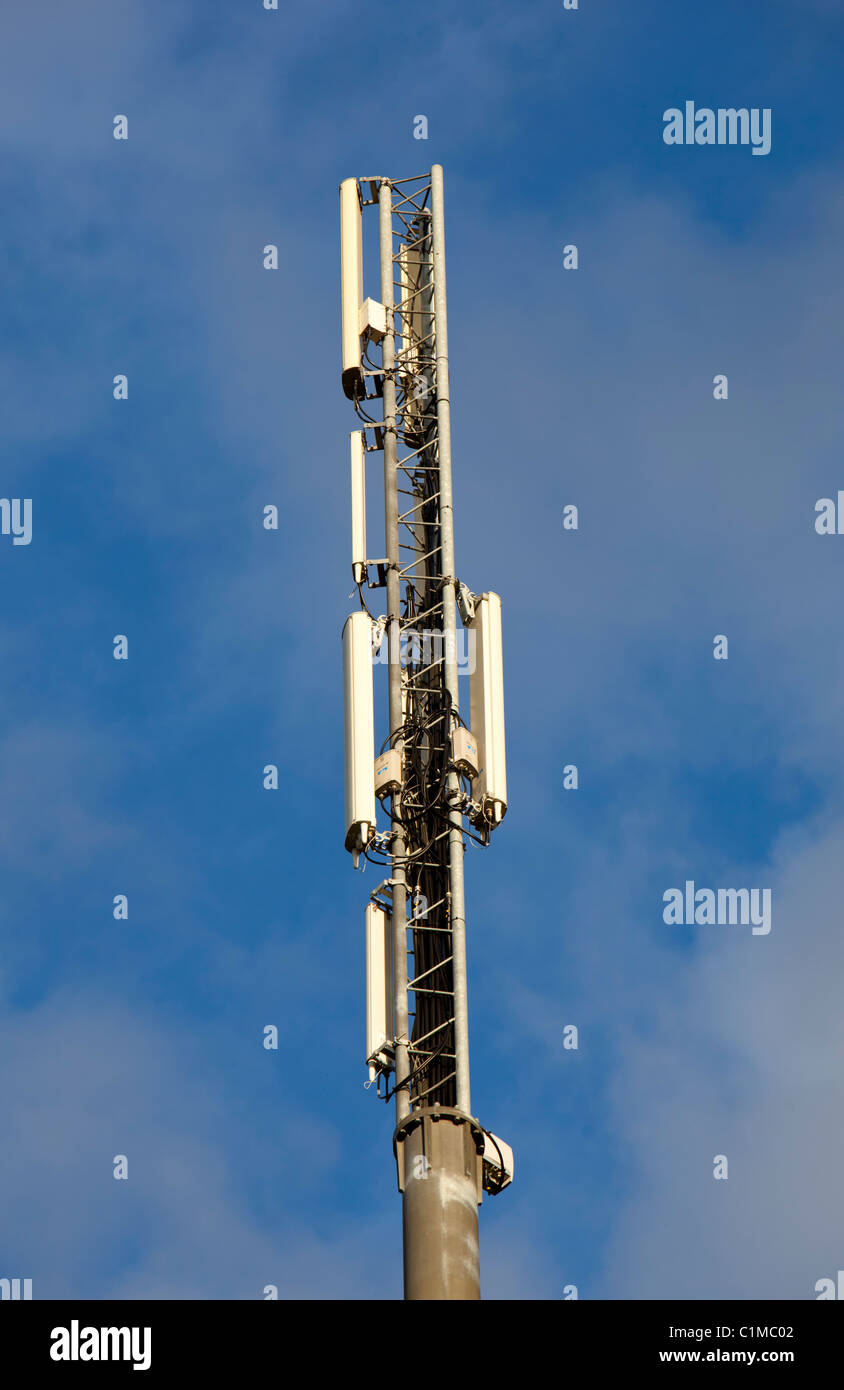Cellular network antennas on top of a antenna mast , Finland Stock