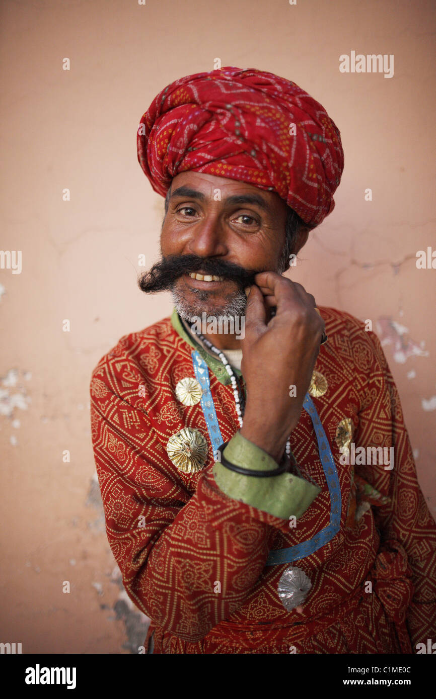 IND, India,20110310, Portrait from a Indian man with a grey beard, a red turban with traditional costume Stock Photo