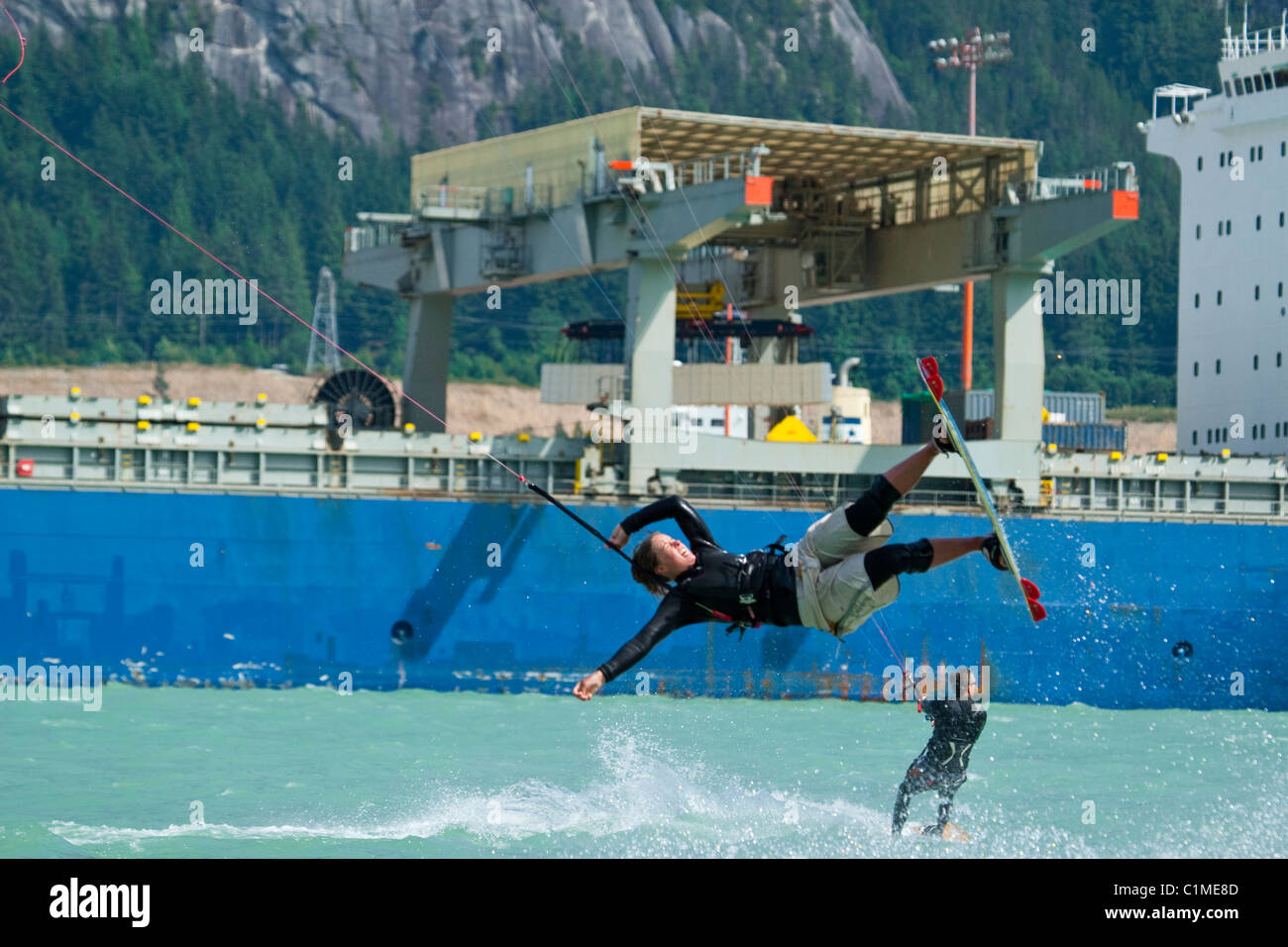 AIrborne kiteboarder at 'the Spit', Squamish, BC, Canada. Stock Photo