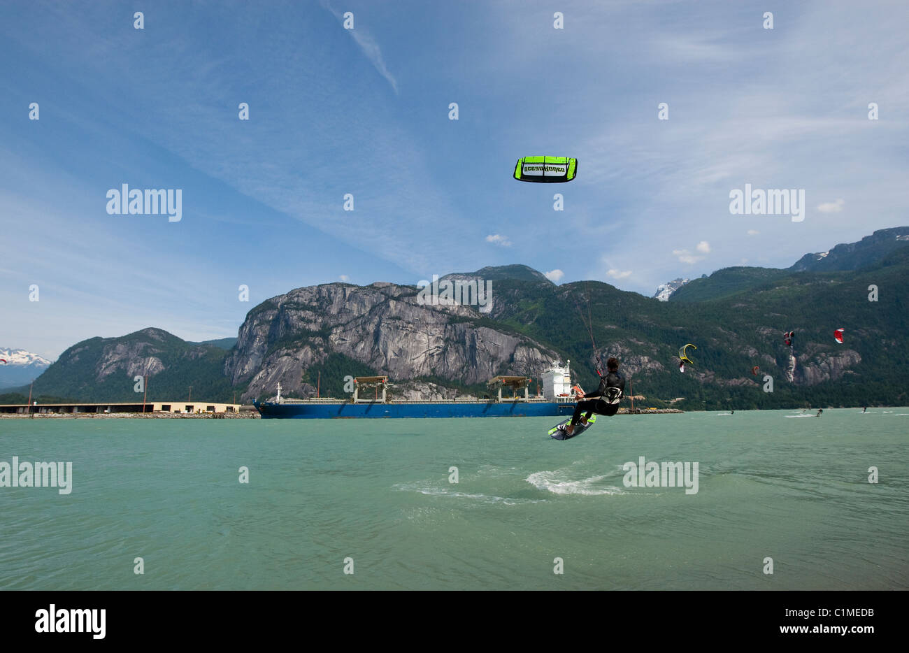 AIrborne kiteboarder at 'the Spit', Squamish, BC, Canada. Stock Photo