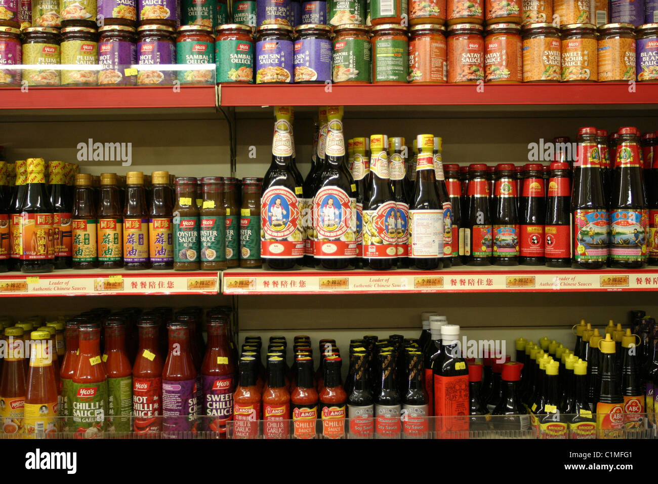 Stir Fry Sauces on a Chinese Supermarket Shelf Stock Photo