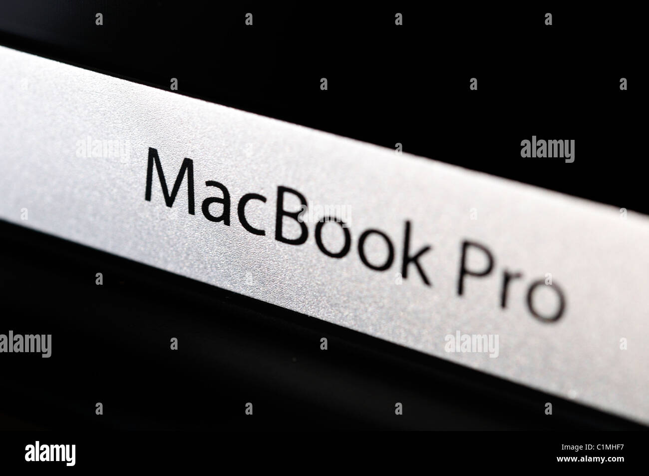 The logo from the 'unibody' MacBook Pro. Stock Photo