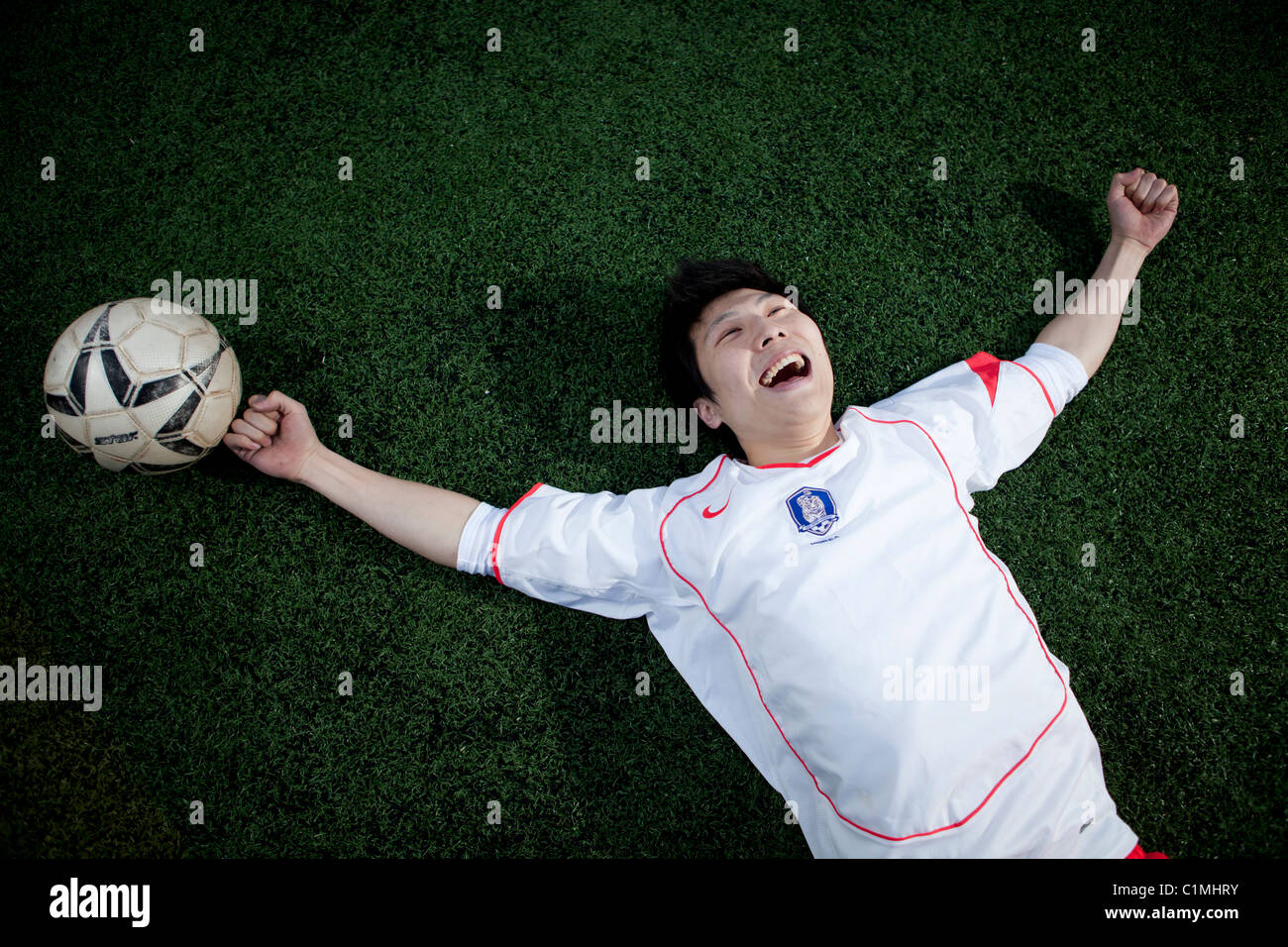Footballer wearing Korean national team jersey in Chugju, Chungbuk