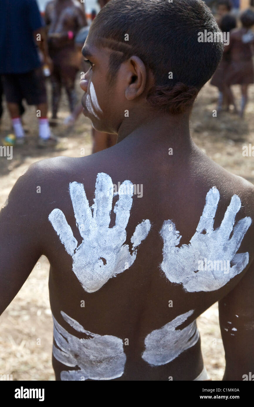 Handprint decorations on the back of an indigenous boy.  Laura Aboriginal Dance Festival, Laura, Queensland, Australia Stock Photo