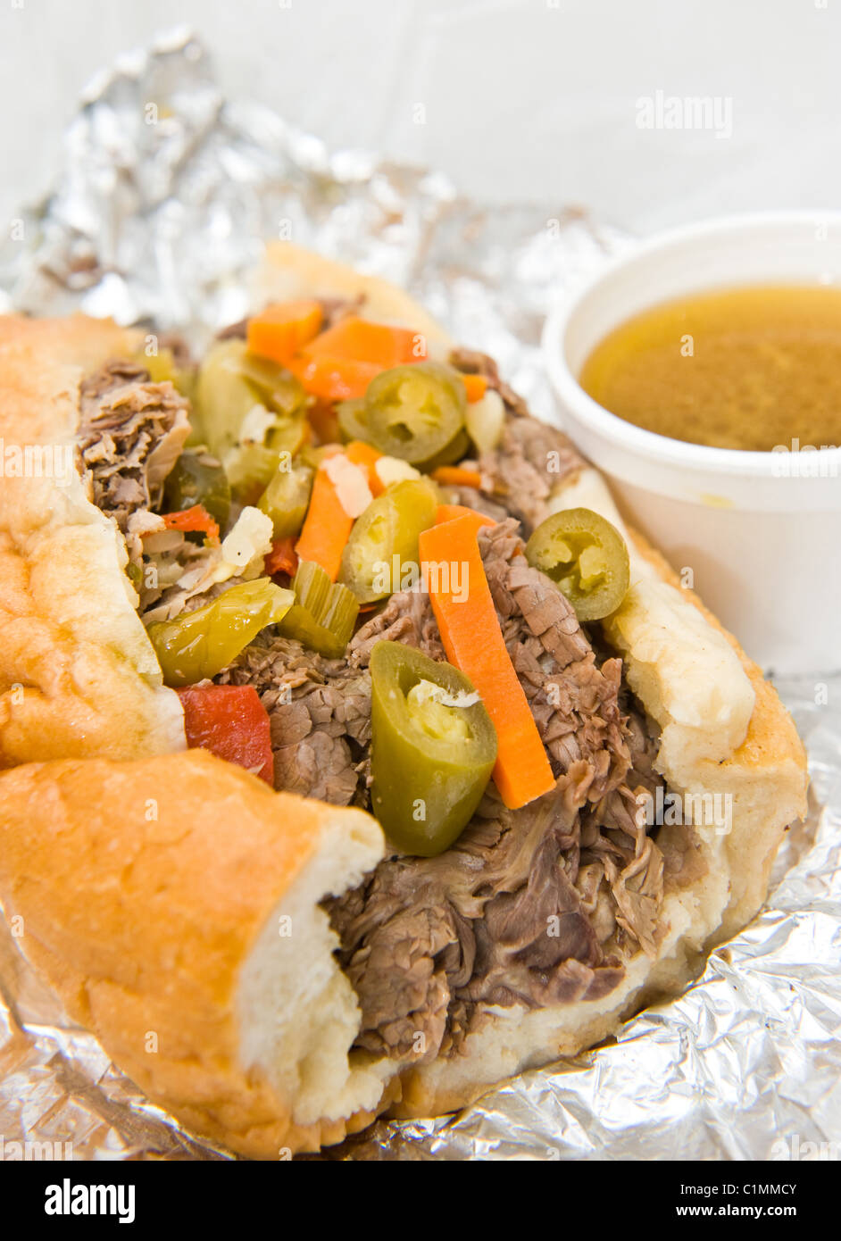 Chicago style Italian beef sandwich with giardiniera and dipping sauce ...