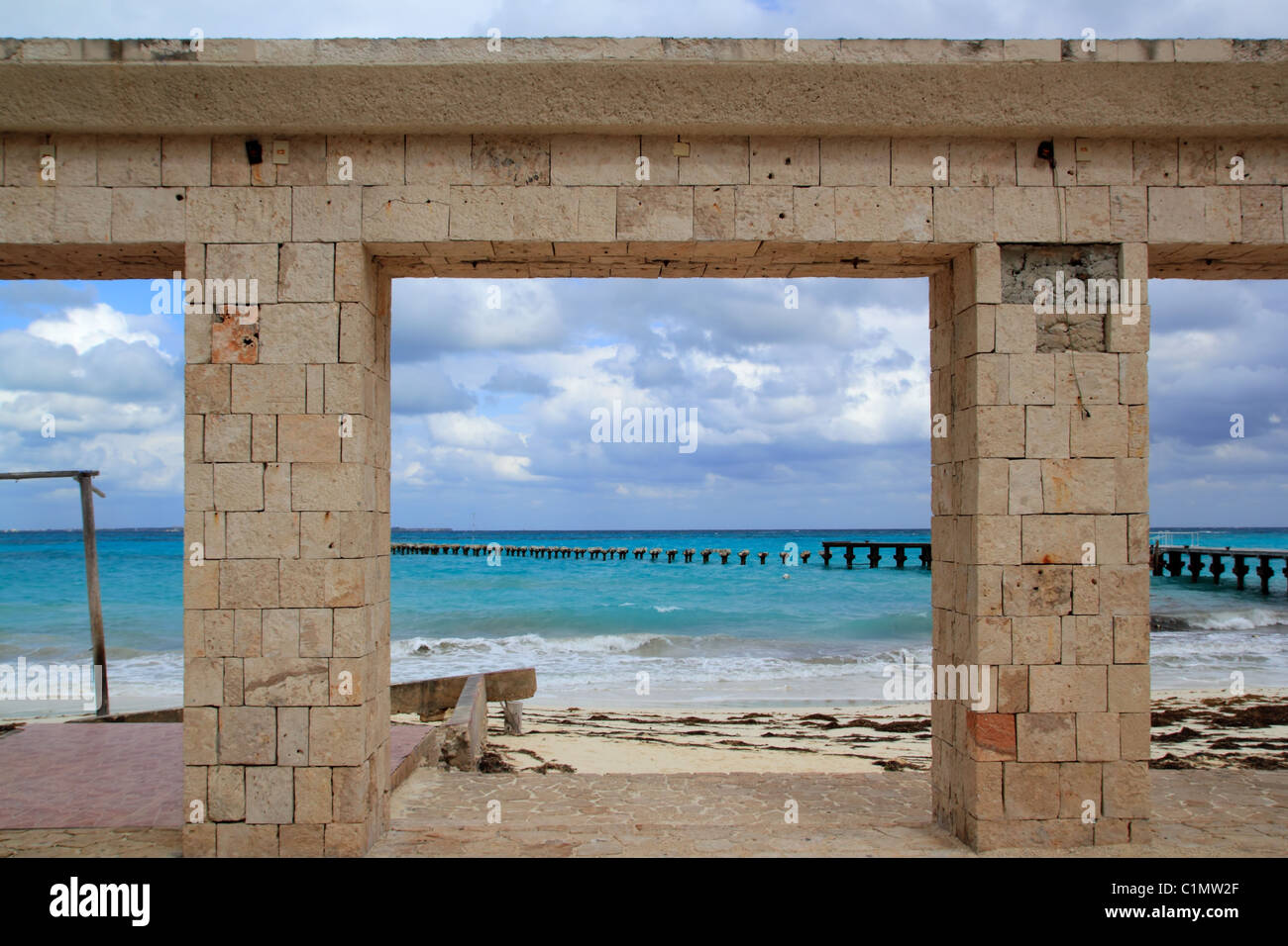 damaged pier and beach after hurricane tropical storm Mexico Stock Photo