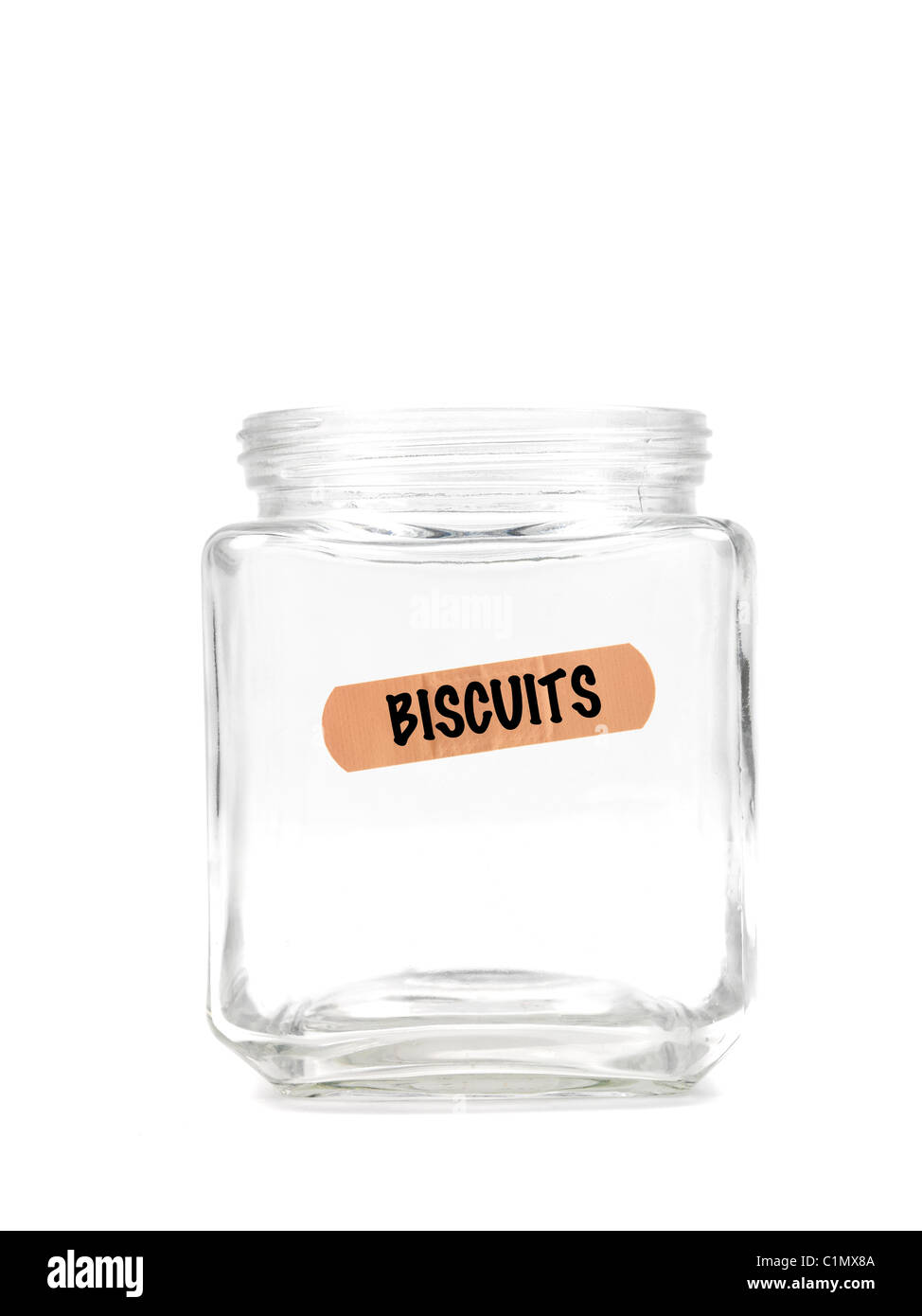 An empty jar with a biscuit label isolated against a white background Stock Photo