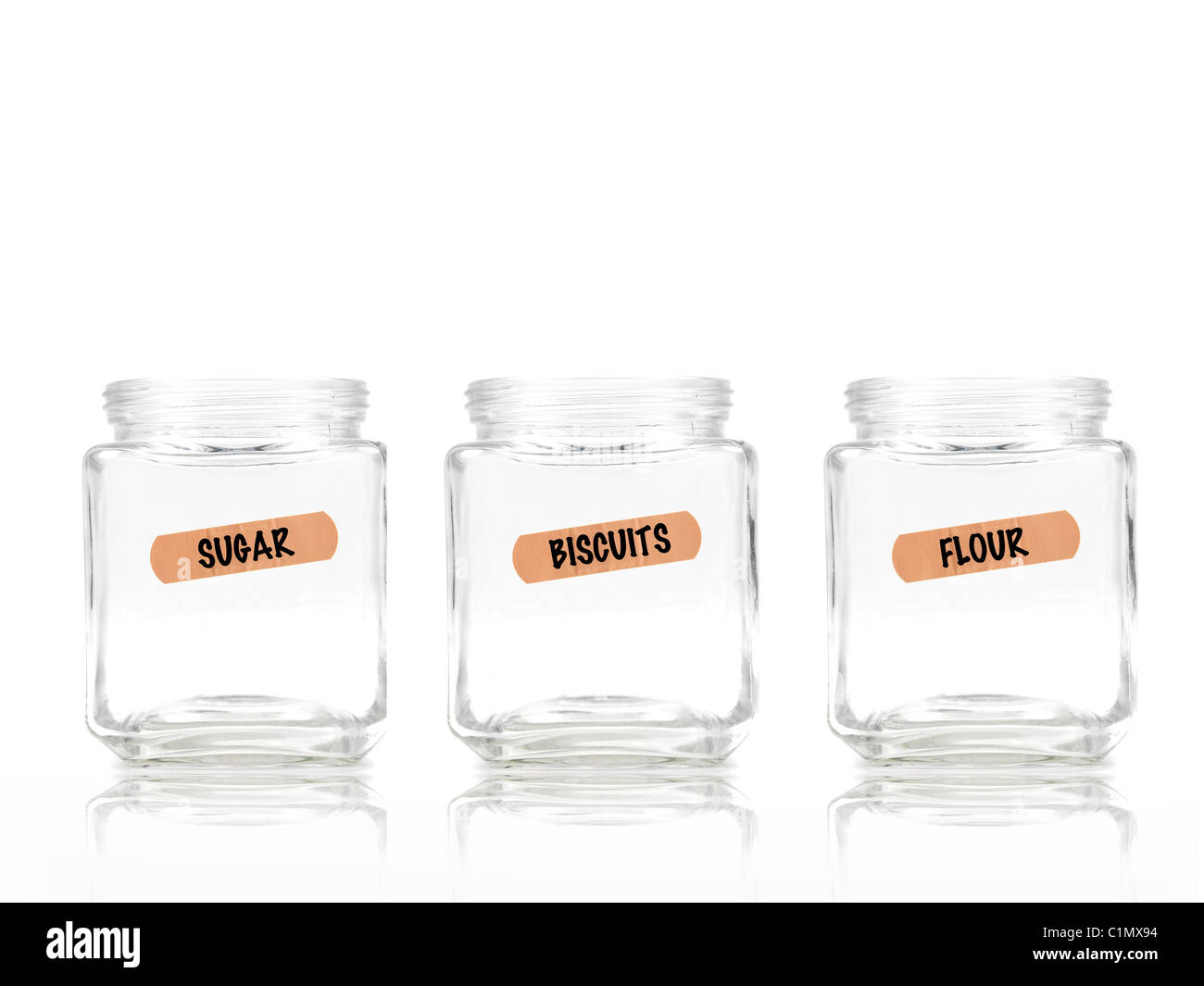 Empty food jars isolated against a white background Stock Photo