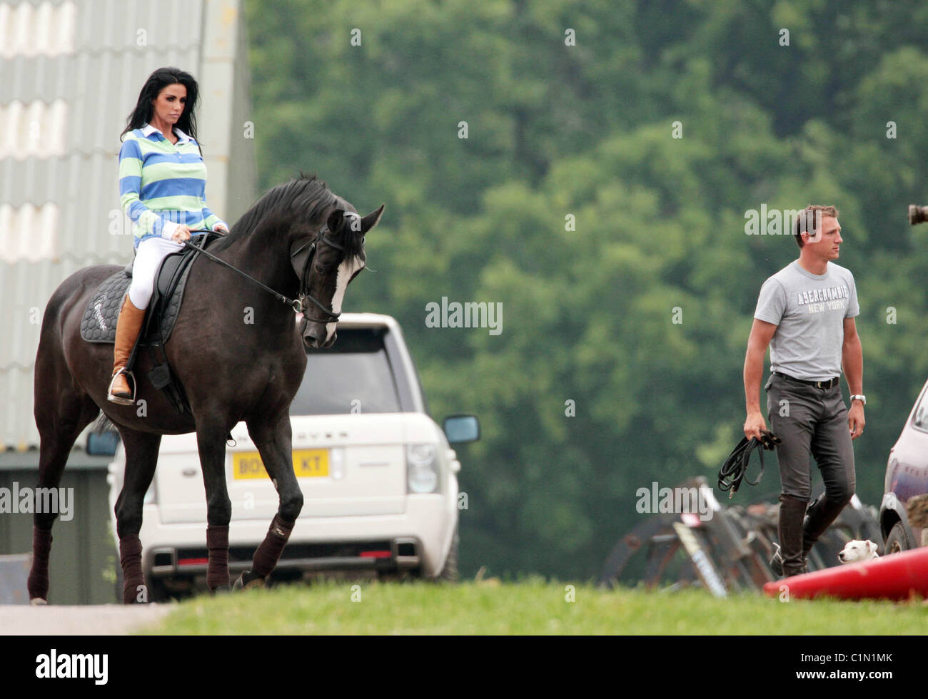 Katie Price aka Jordan riding her horse at the stables with her riding ...