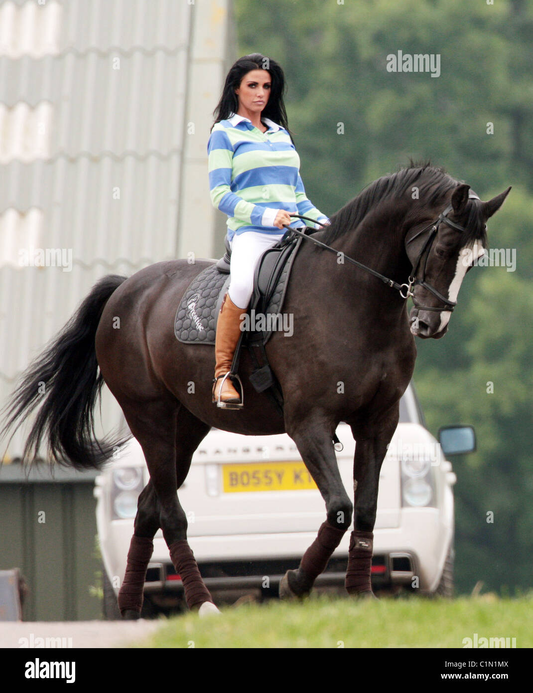 Katie Price aka Jordan riding her horse at the stables East Sussex, England  - 26.06.09 .com Stock Photo - Alamy