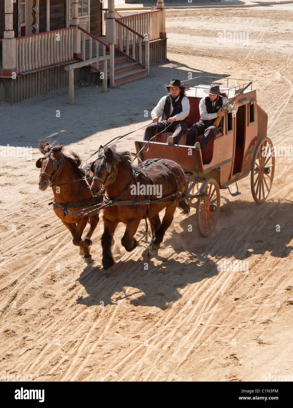 Sheriff and Deputy driving a stagecoach on a movie set at Mini Hollywood, Almeria, Andalusia, Spain Stock Photo