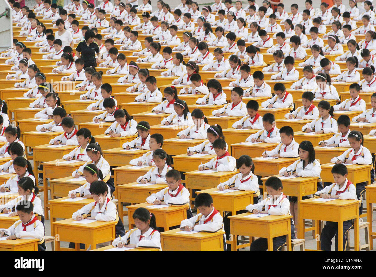 World's largest classroom A sea of school pupils take part in a writing