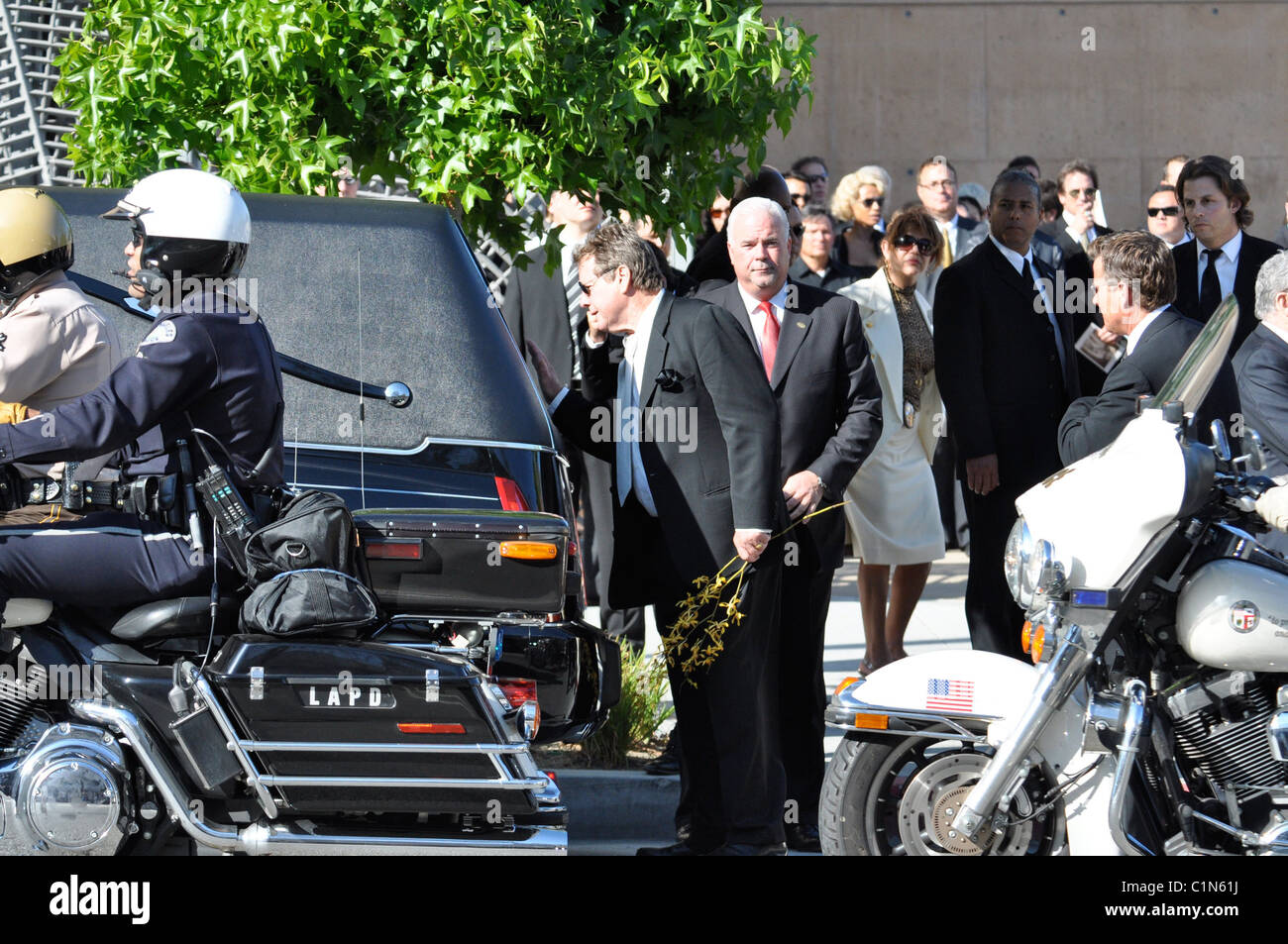 at the funeral service for actress Farrah Fawcett at the Cathedral of ...