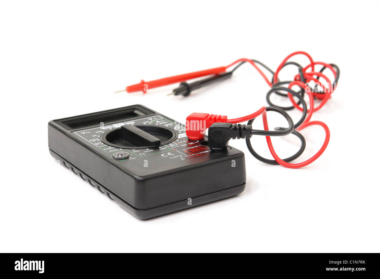 Black multimeter with black and red probes over white background Stock