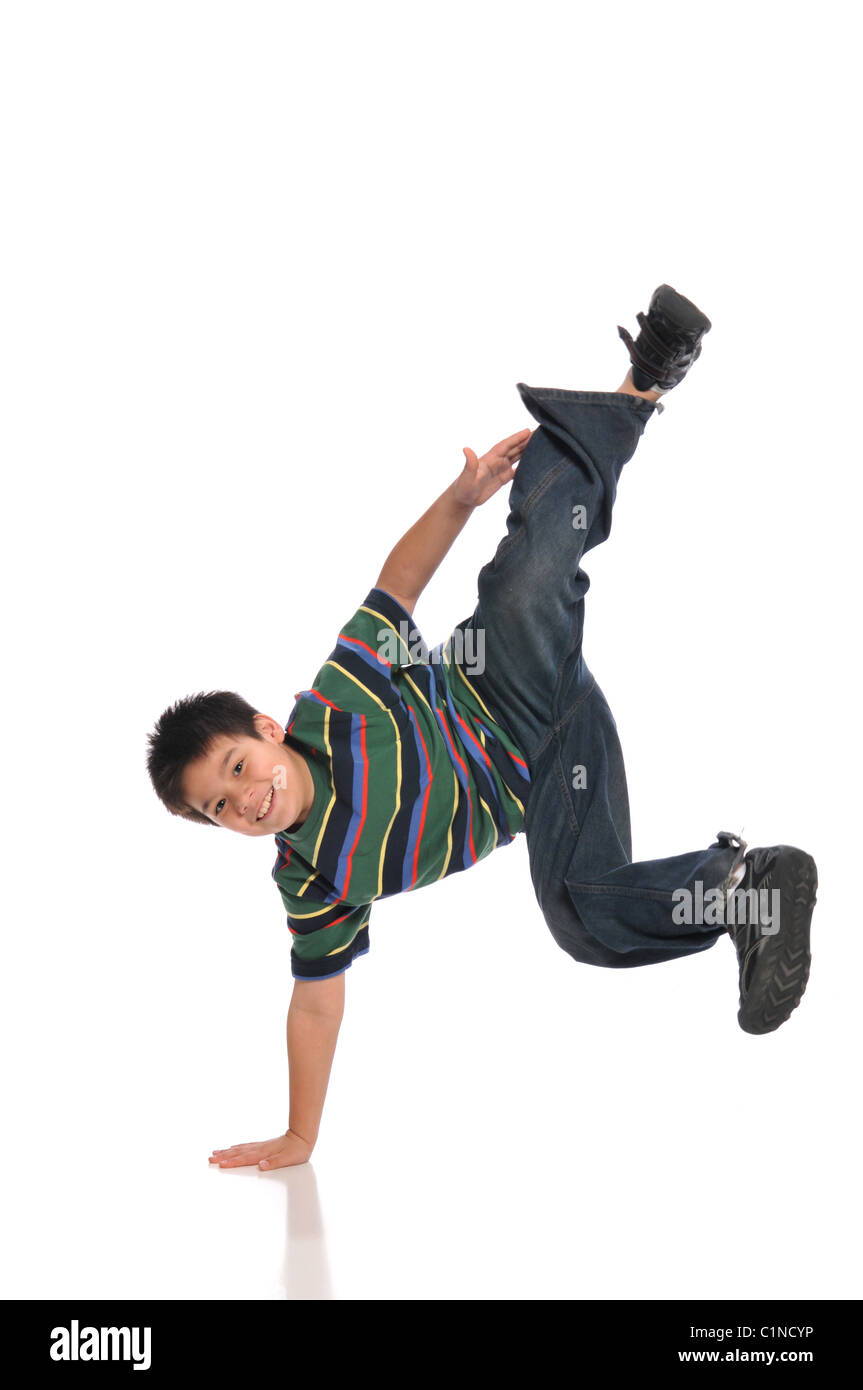 Child tap dancer making a move isolated on white background Stock Photo