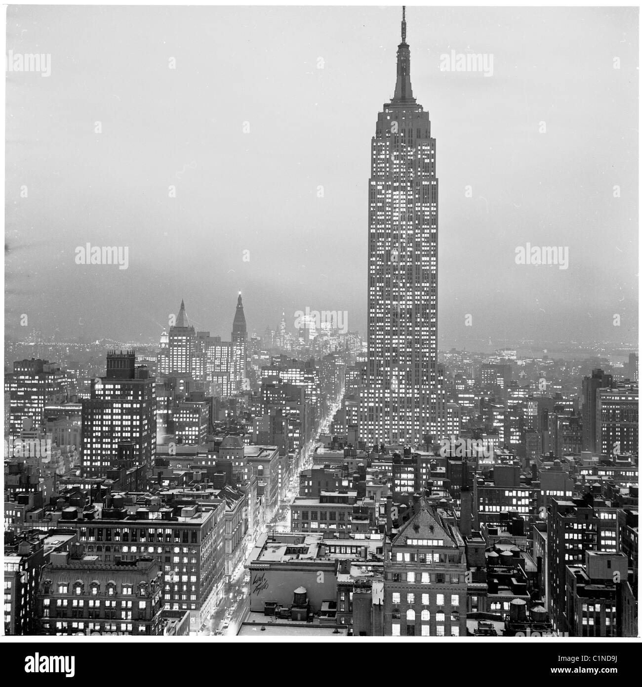1950s. New York. View of the city and skyscrappers at night as seen in the 1950s in this