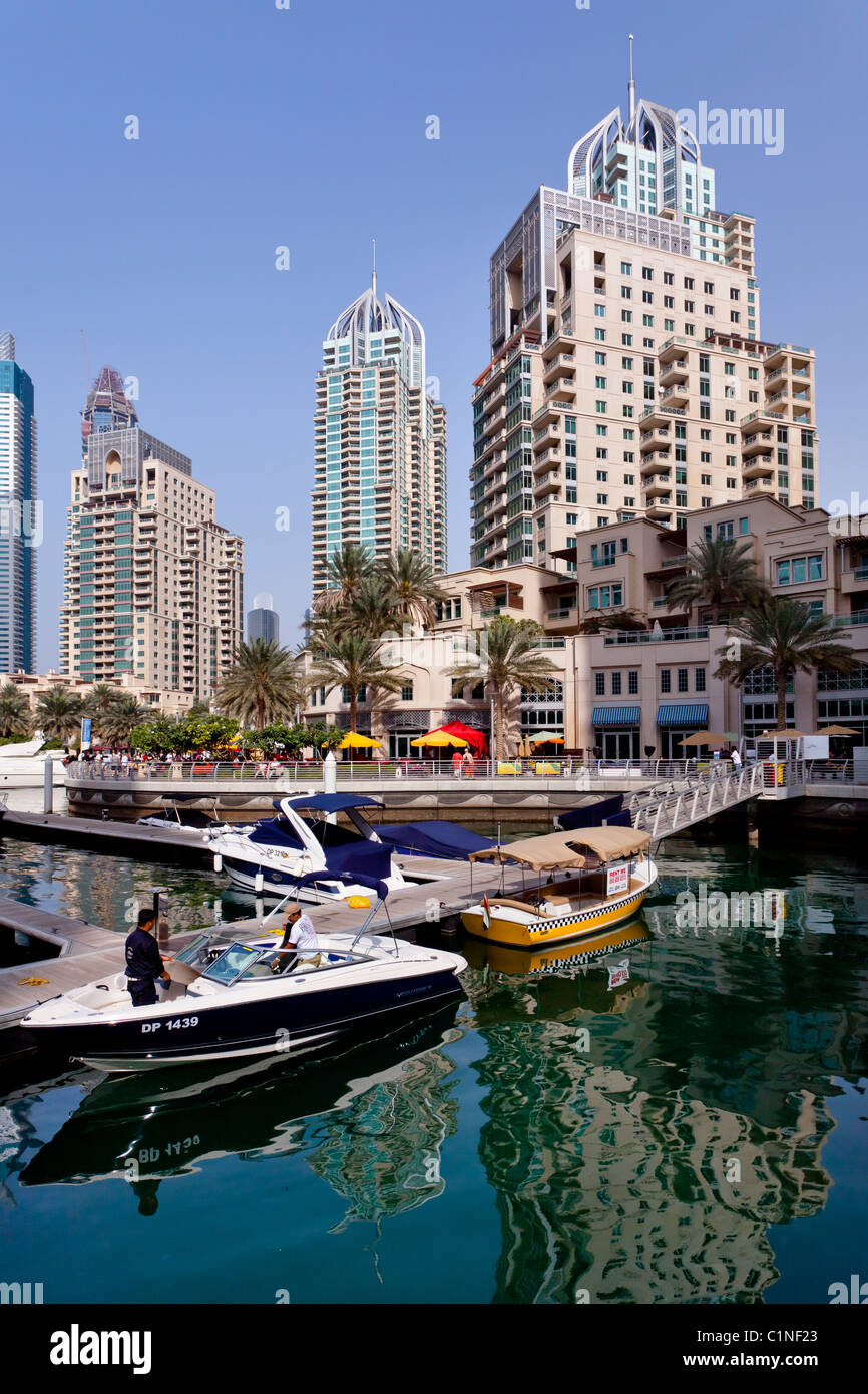 The Dubai Marina with high rise buildings and boats in Dubai, UAE, Persian Gulf. Stock Photo
