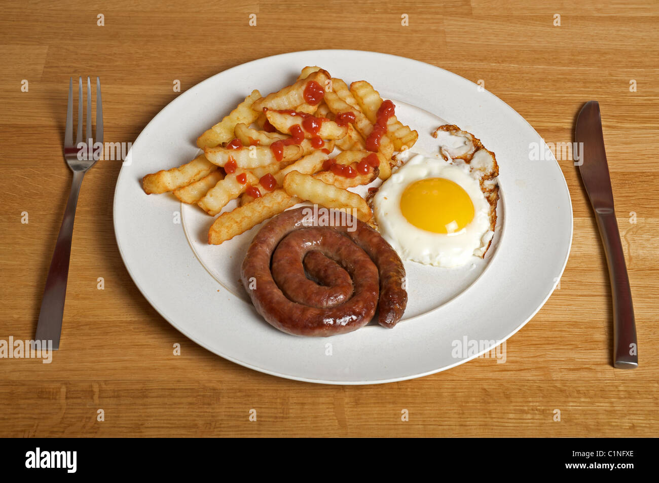 Sausage, eggs and chips Stock Photo Alamy