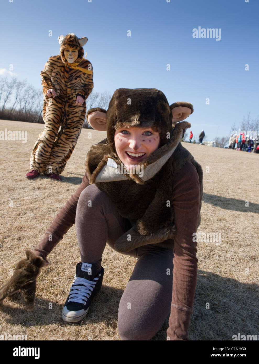Teenagers dressed up in cat costumes, Hljomskalagardur  Park, Reykjavik Iceland Stock Photo