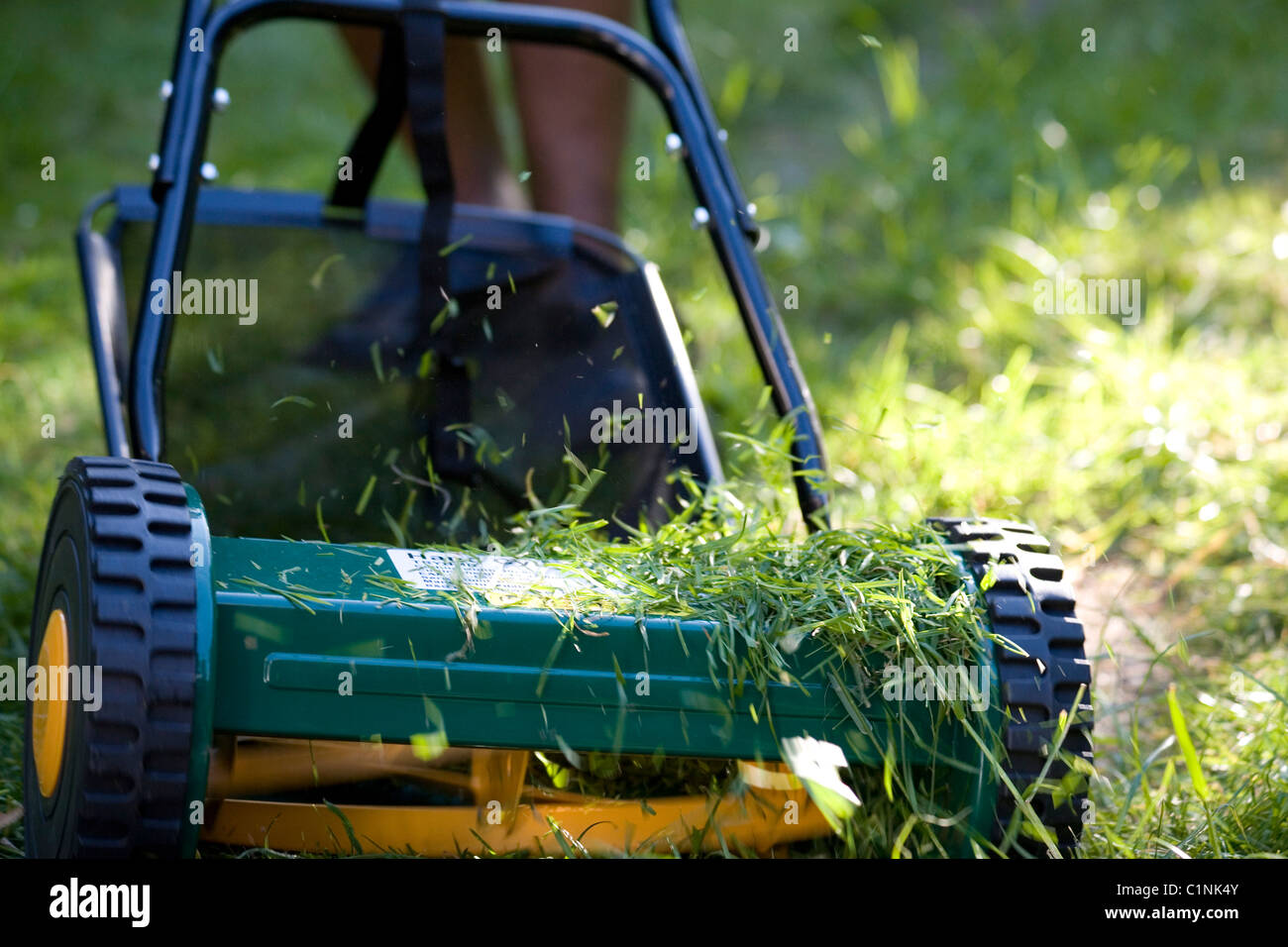 Hand lawn mower hires stock photography and images Alamy