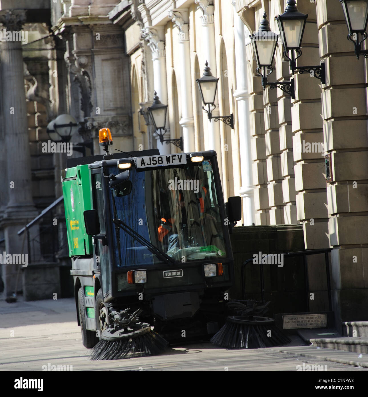Street cleaning on Colmore Row in central Birmingham England UK Stock