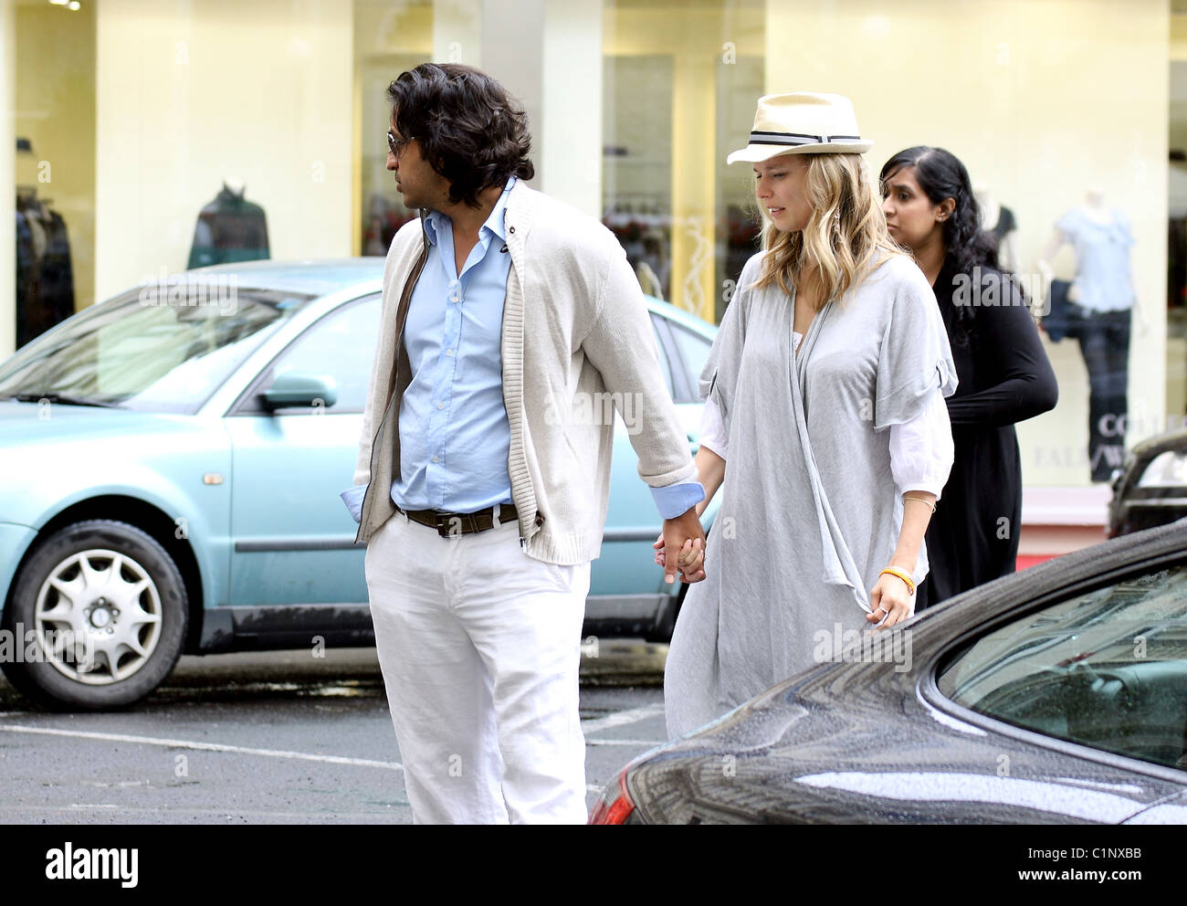 Model Helena Houdova and husband Omar Amanat take a walk through the