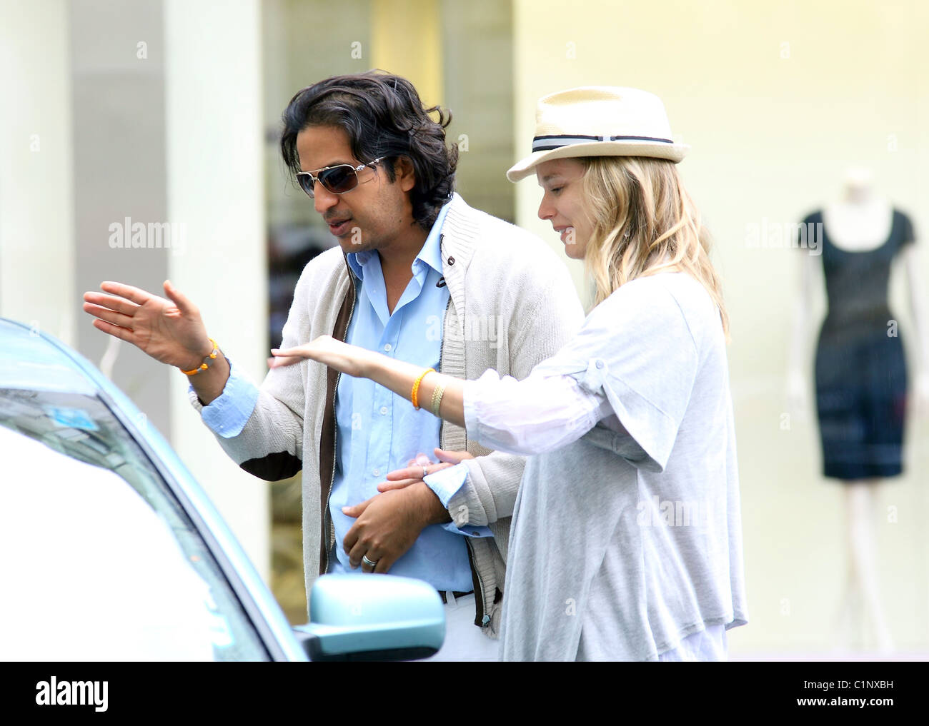 Model Helena Houdova and husband Omar Amanat take a walk through the