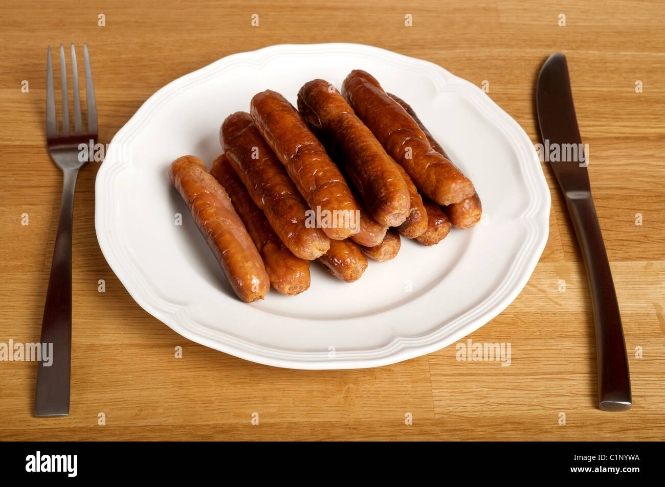 Plate of grilled sausages Stock Photo