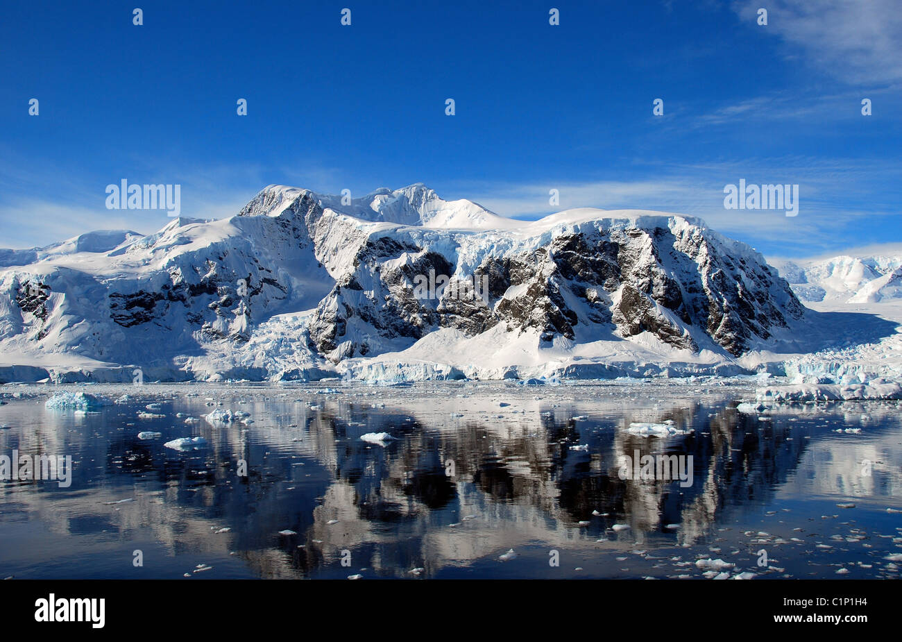 crystal clear reflection of antarctic landscape in the water Stock Photo