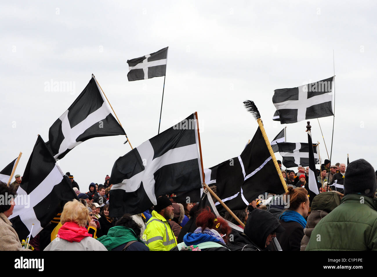 Cornish people marching with the St.Pirans flag on St.Pirans day, perranporth, Cornwall, UK Stock Photo