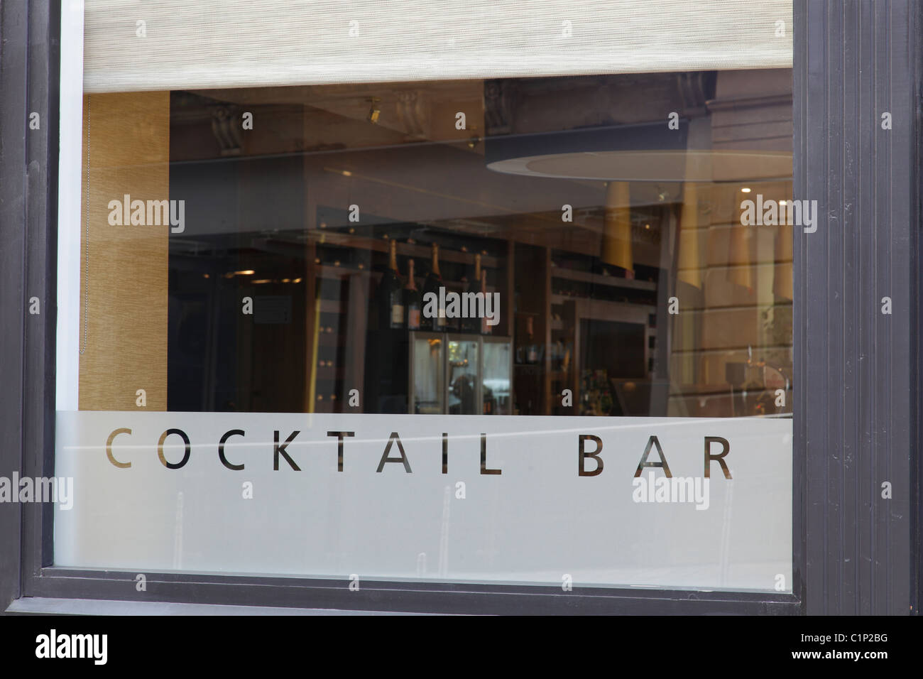 Cocktail Bar sign in the exterior window of Mediterraneo Bar in Glasgow, Scotland, UK Stock Photo