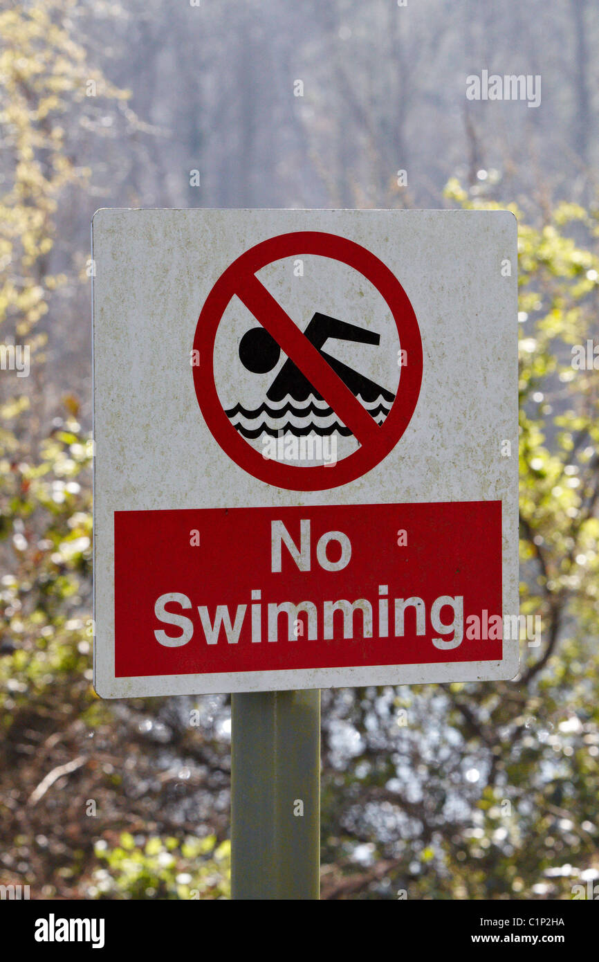 No swimming signs around Heathfield Pond where Alfie Skelton drowned after falling into the water from a dinghy. Stock Photo