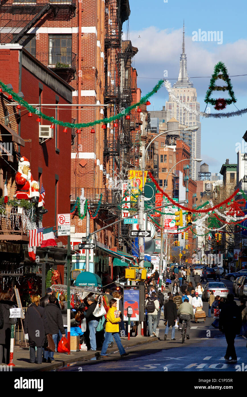United States New York City Manhattan Little Italy Mulberry Street with Christmas decorations Empire State Building in the Stock Photo