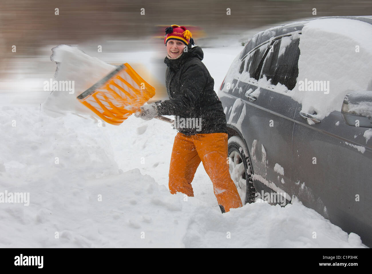 Shoveling out car winter happy hires stock photography and images Alamy