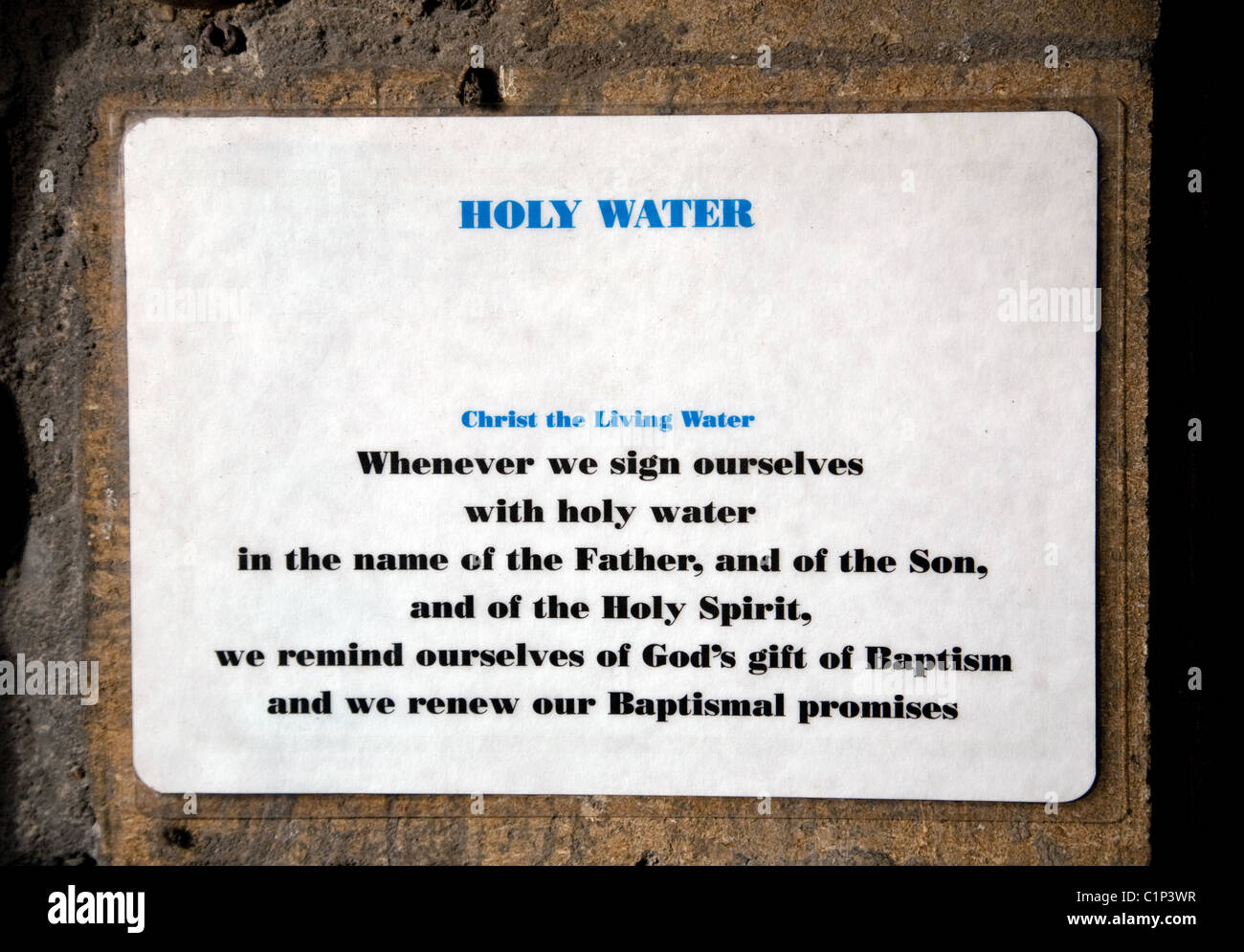 Holy water sign, All Saints Church, Stock village, Essex, UK Stock Photo