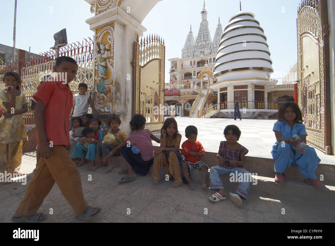 Children outside a religious temple in Ludhiana, Punjab, India. Stock Photo
