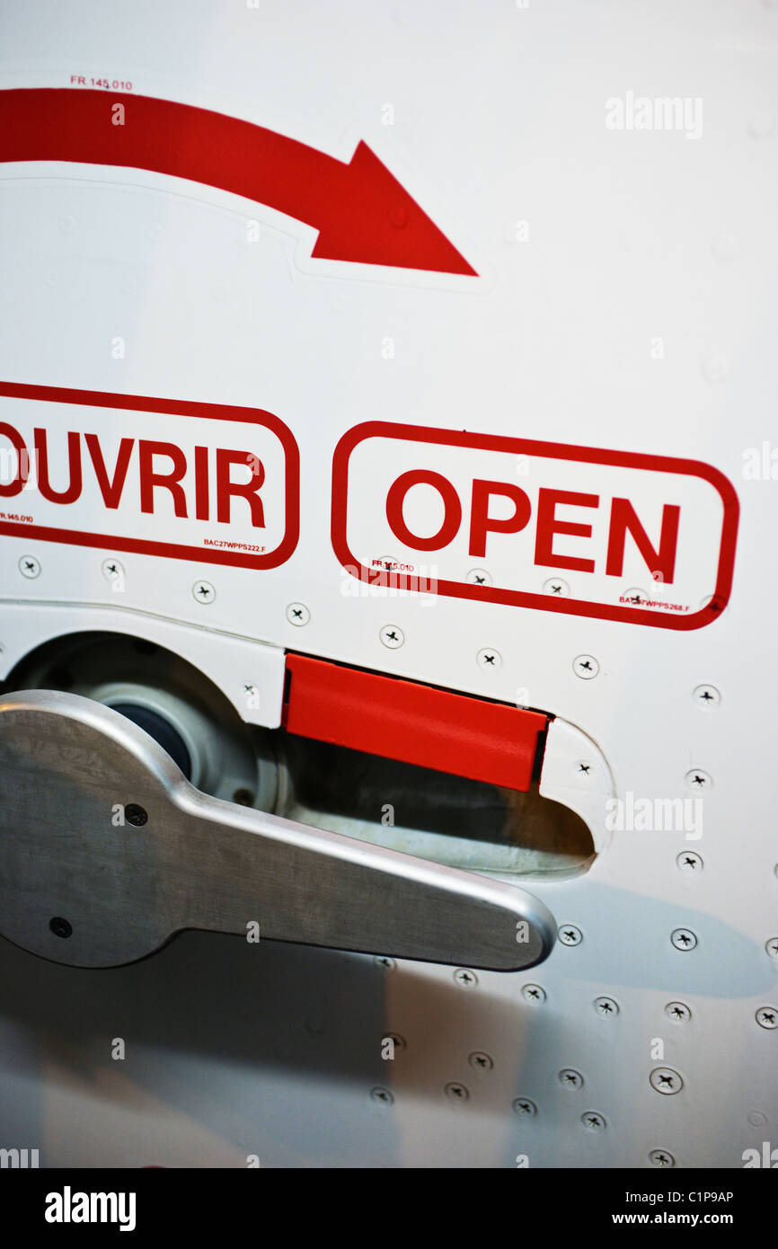 Emergency exit in plane Stock Photo