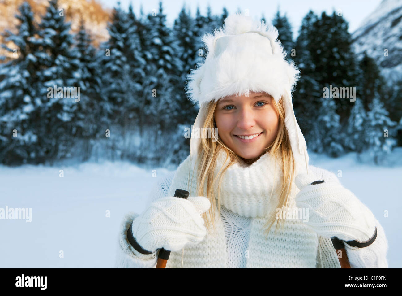 Portrait of girl wearing winter clothes, outdoors Stock Photo Alamy