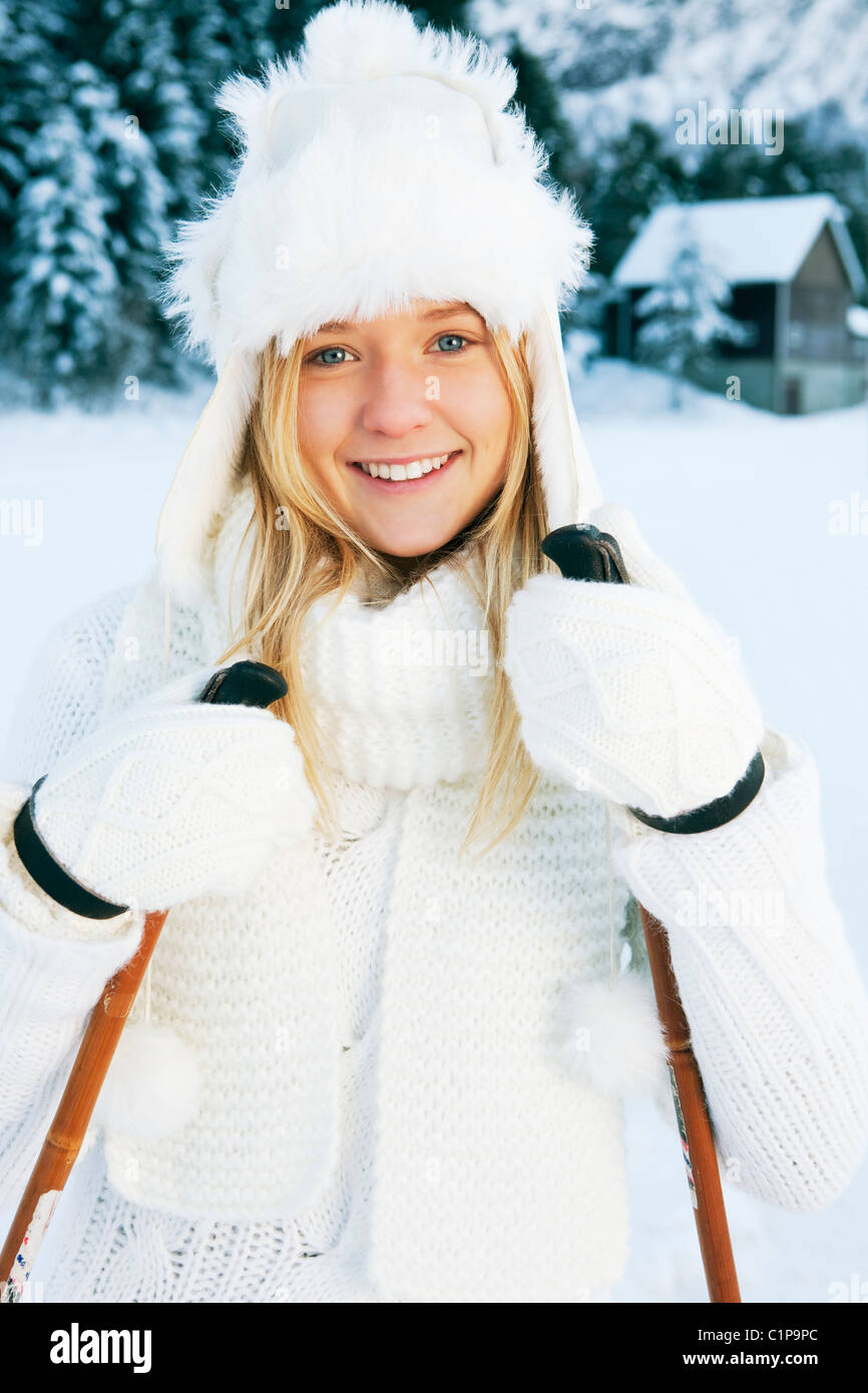 Portrait of teenage girl in white winter clothing Stock Photo - Alamy