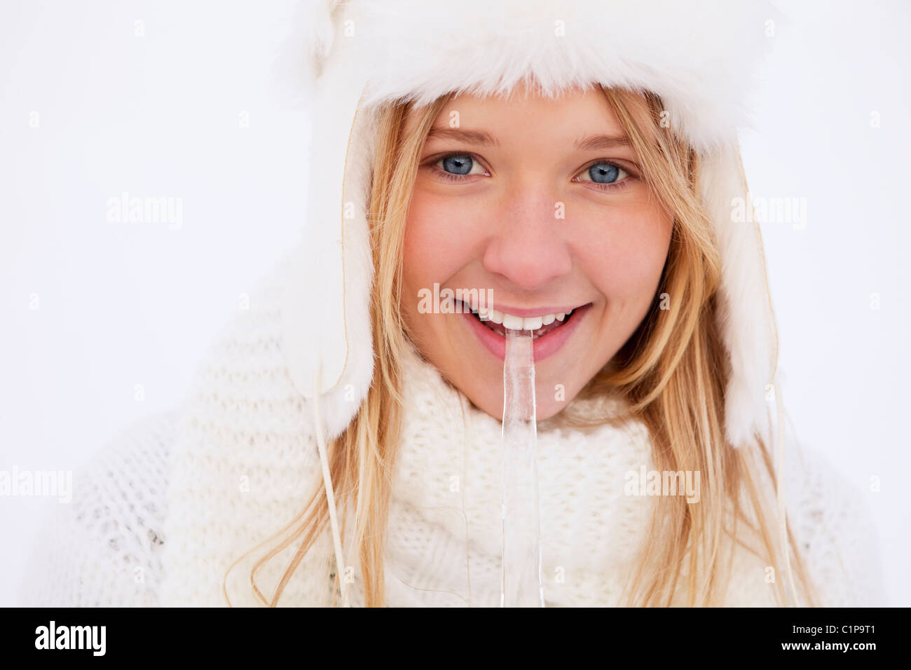Portrait of teenage girl in white winter clothing Stock Photo - Alamy