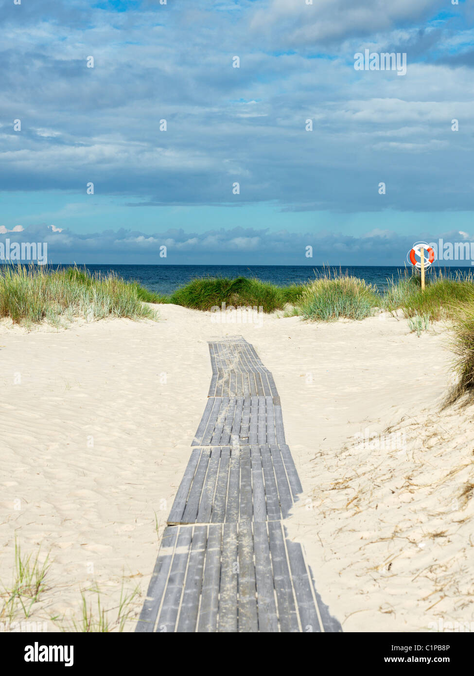 Beach boardwalk leading to sea Stock Photo