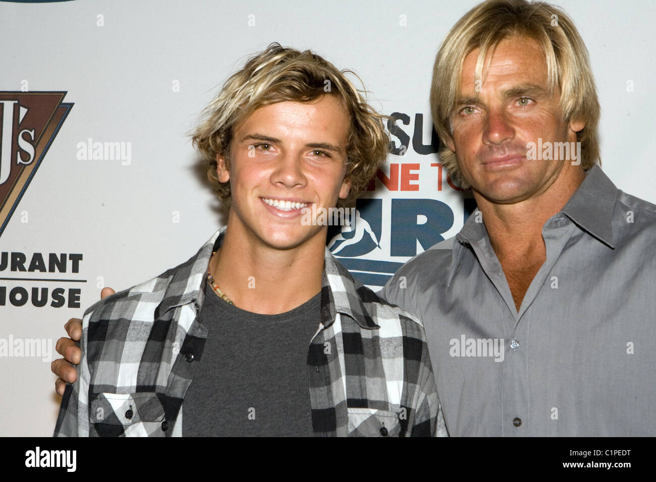 Laird Hamilton and Julian Wilson The Pacsun Pipeline Campaign Fundraiser for Cystic Fibrosis held in the Hyatt Regency Resort Stock Photo