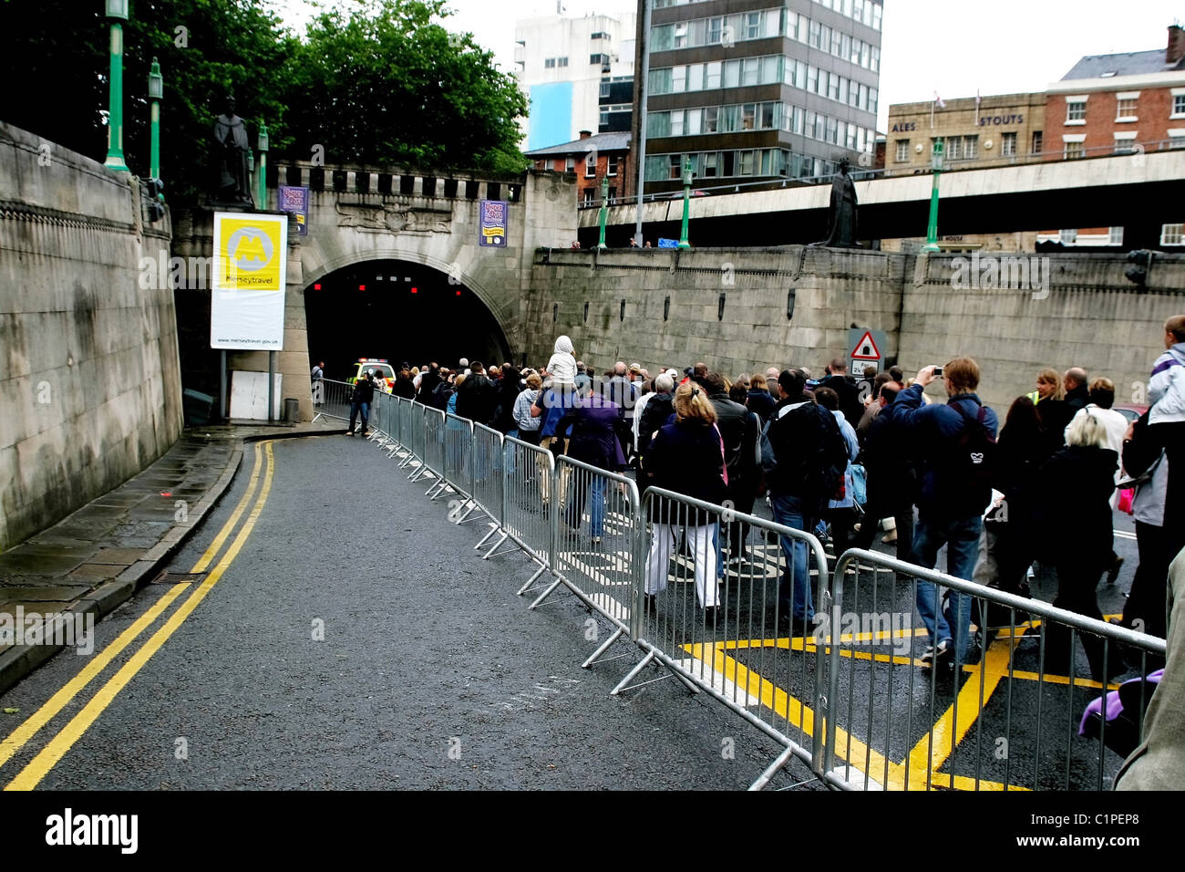 Walkers making their way through tunnel Charity walk through the Mersey