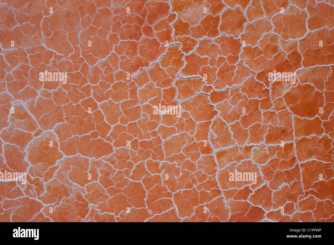 VERTICAL AERIAL VIEW. Pink salt lake. Searles Lake is a dry lake near Trona in Southern California, USA. Stock Photo