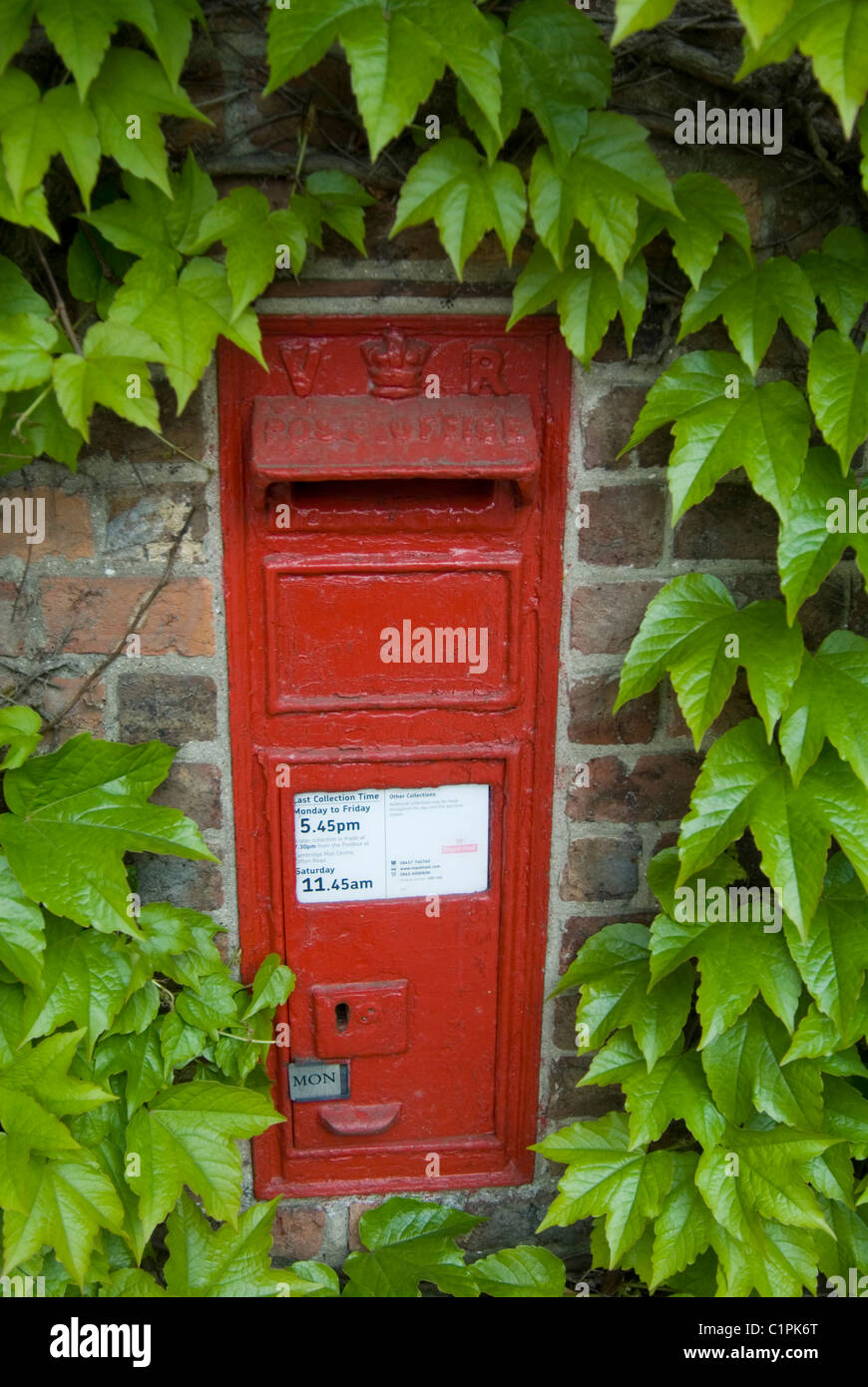 England, Cambridgeshire, Grantchester, Victorian village post box Stock Photo