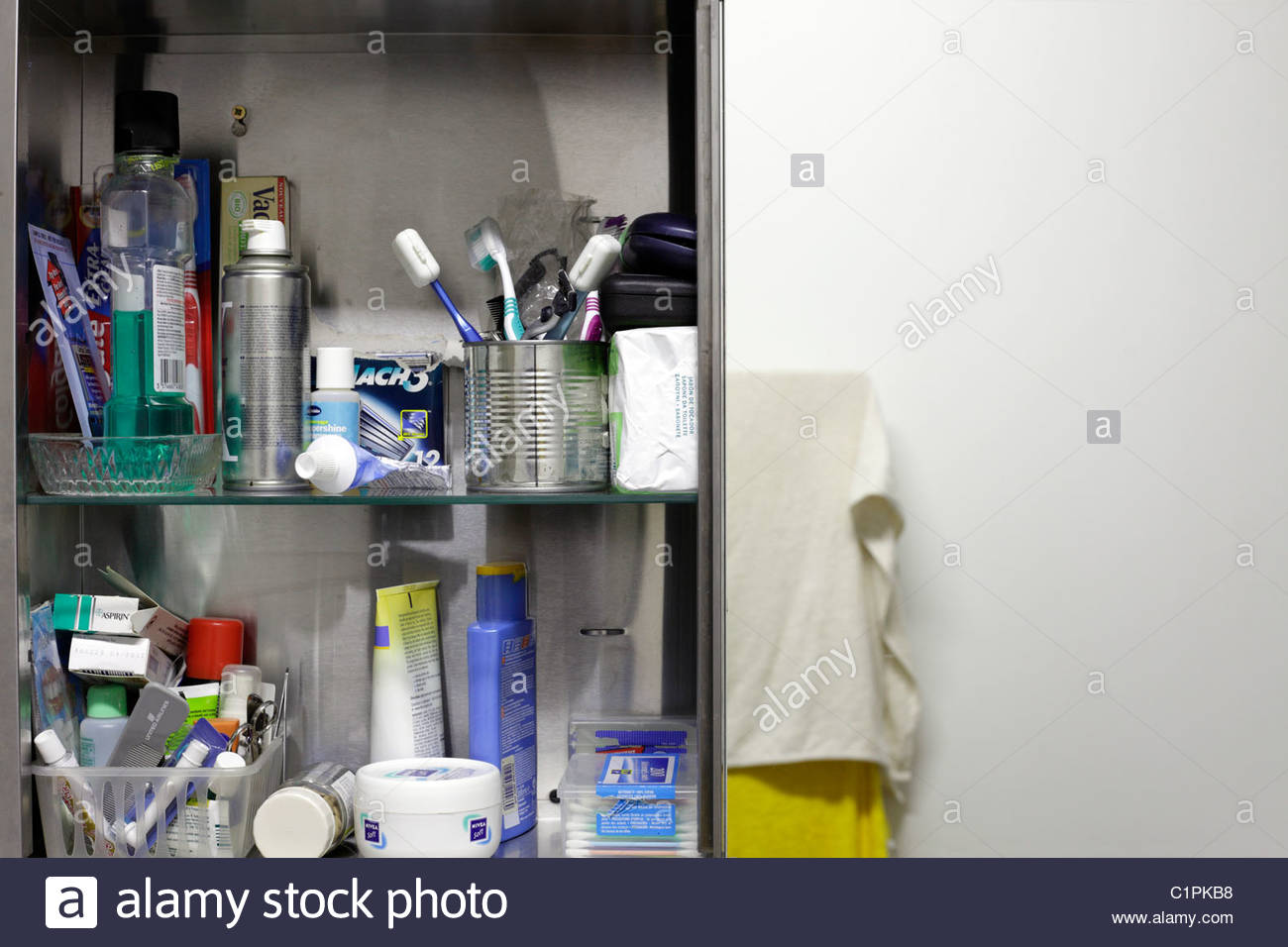 Open Medicine Cabinet With Mirror In Domestic Bathroom Stock Photo