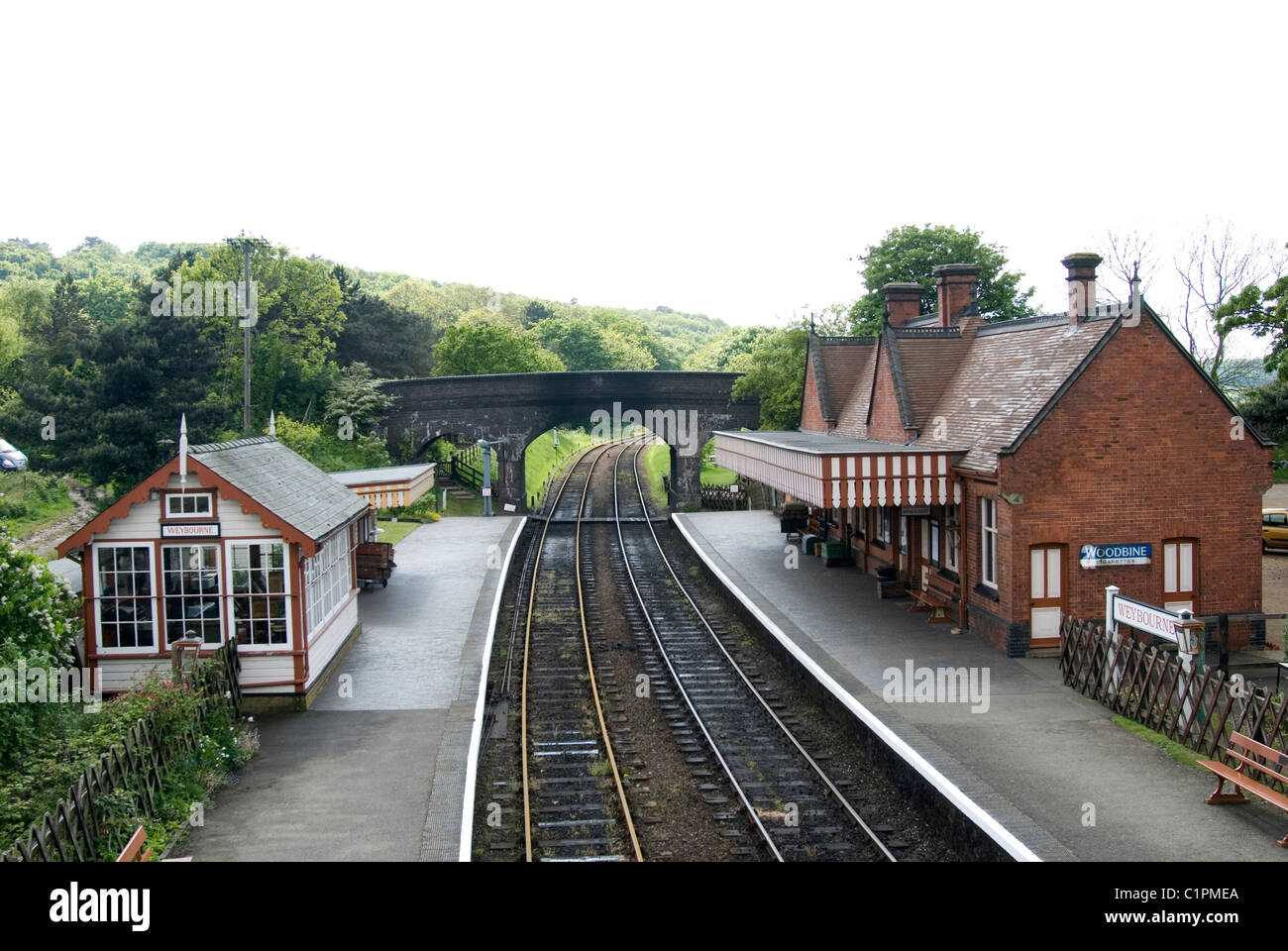 England, Norfolk, Weybourne Railway Station, bridge, track and platform Stock Photo