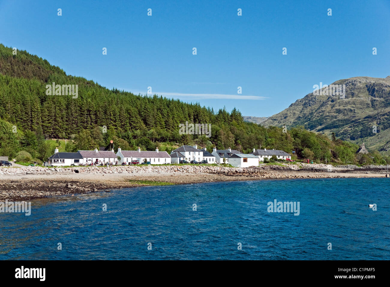 The small settlement of Inverie in Knoydart Highland of Scotland seen from Loch Nevis Stock Photo