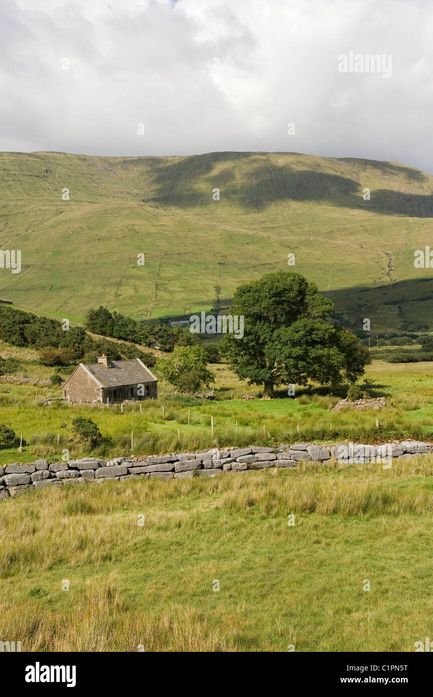 Republic of Ireland, Connemara, Maumtrasna, cottage in countryside Stock Photo
